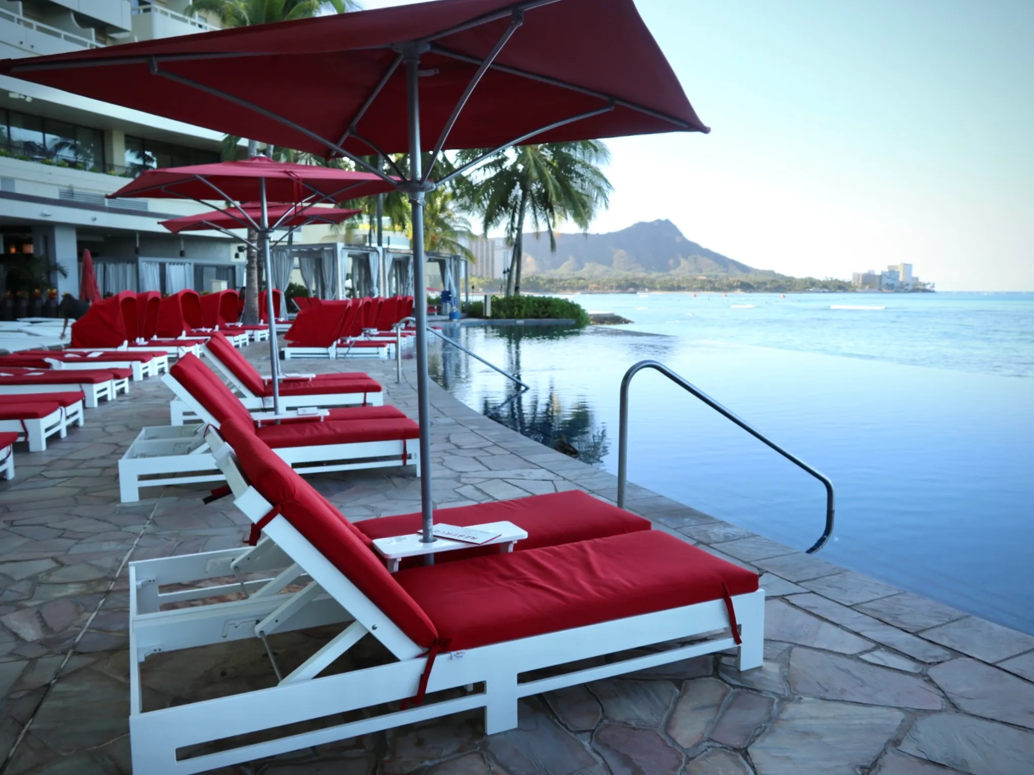 an umbrella sitting on top of a body of water